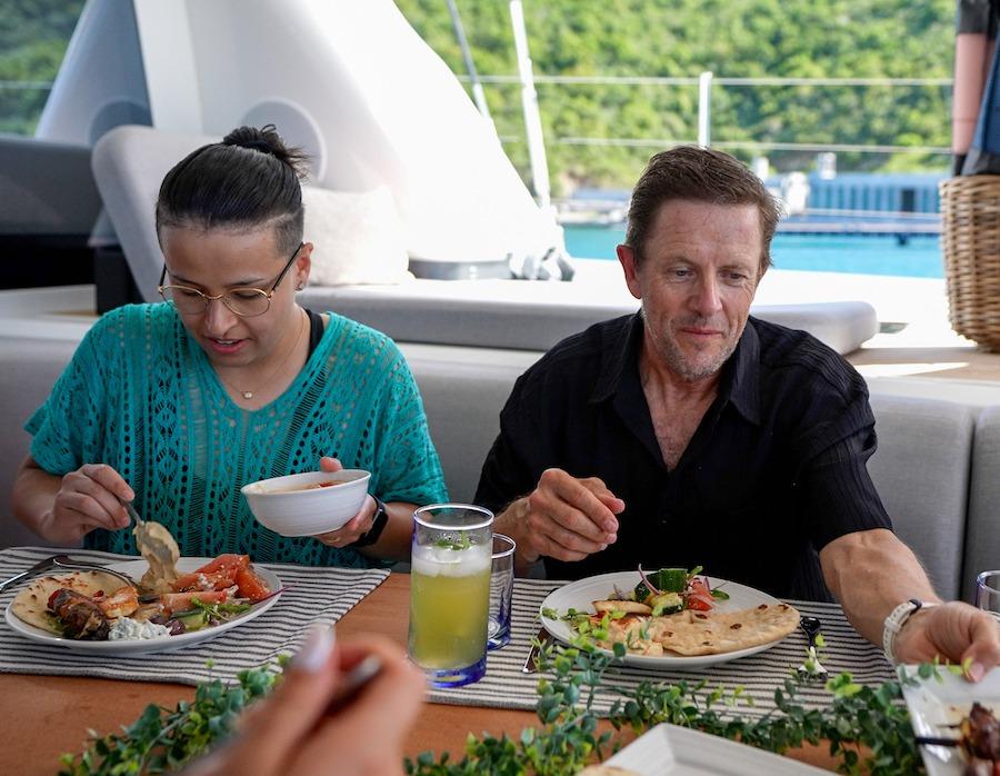 Guests enjoying a delicious meal aboard Endless Summer III